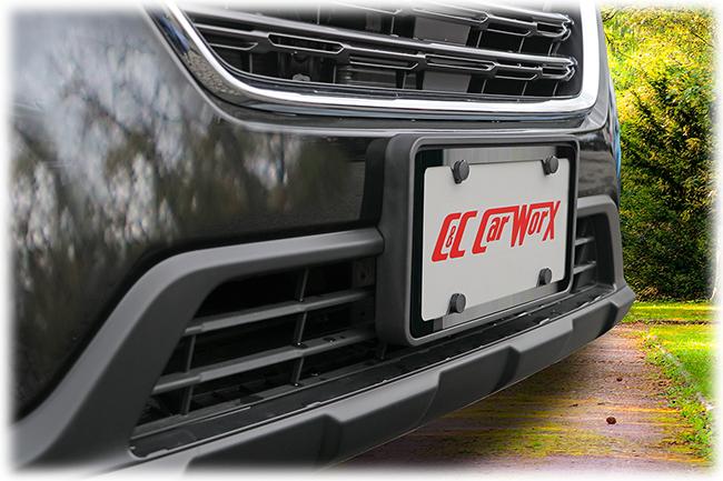 The C&C CarwWorx Front License Bracket and Black Stainless Steel License Plate Frame shown on a 2018 Subaru Outback gives a stylish flair to the vehicle's front end.